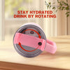 Pink water bottle with a wrist strap on a wooden surface, with text 'Stay Hydrated Drink by Rotating'.